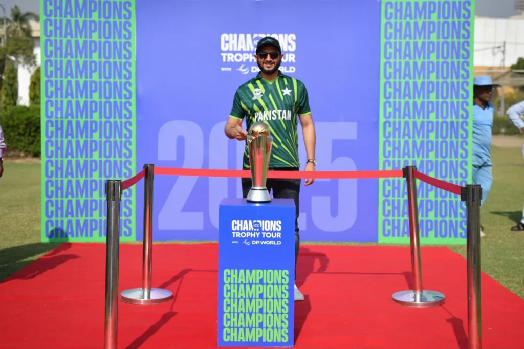 A Pakistan fan poses with the Champions Trophy, Karachi, November 21, 2024